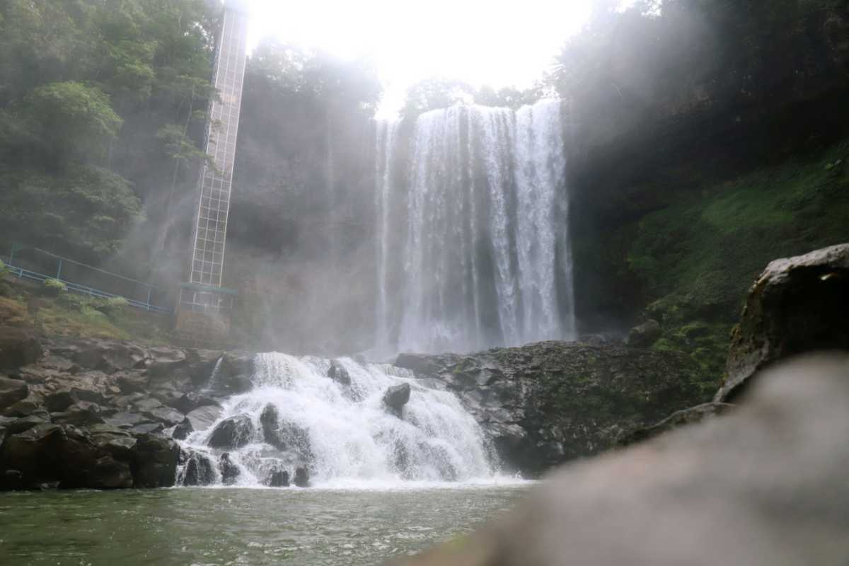 Dambri Waterfall in full flow during the rainy season.