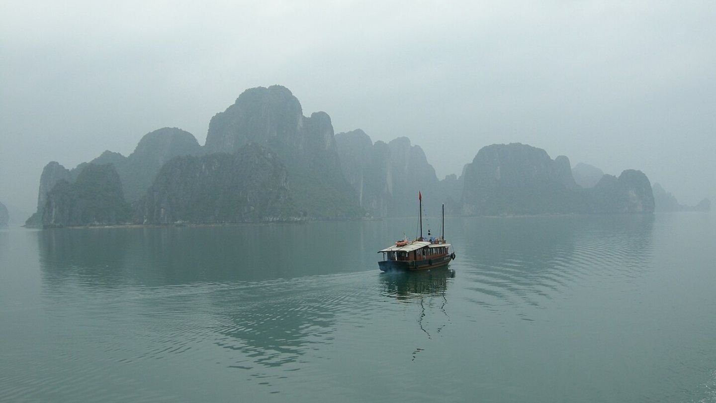Fog rolling over Ha Long Bay on a winter morning