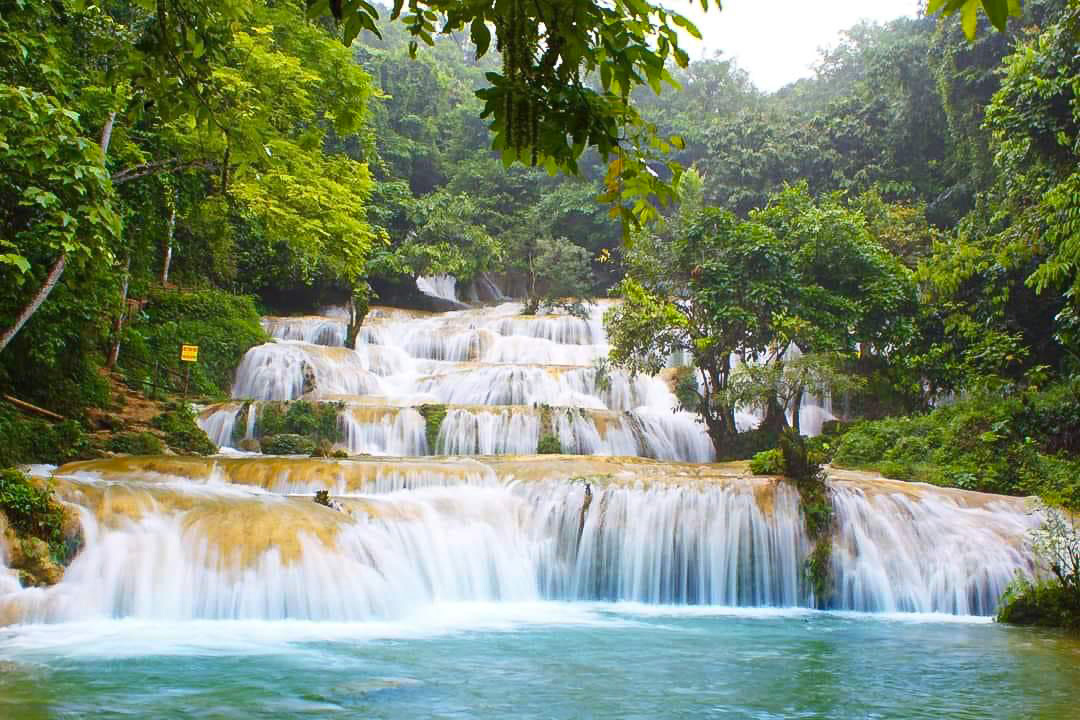 The nine cascading steps of May Waterfall resemble a white staircase.
