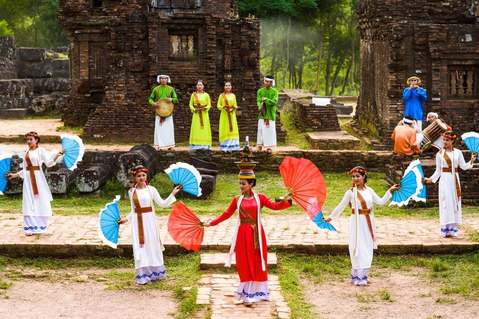 Traditional Cham dancers perform ancient rituals, preserving cultural heritage.
