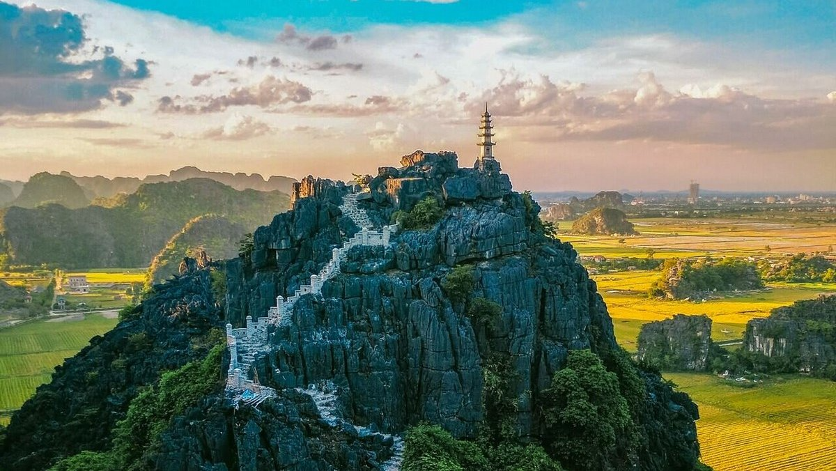 Breathtaking aerial view of Ninh Binh's limestone karsts and rice fields
