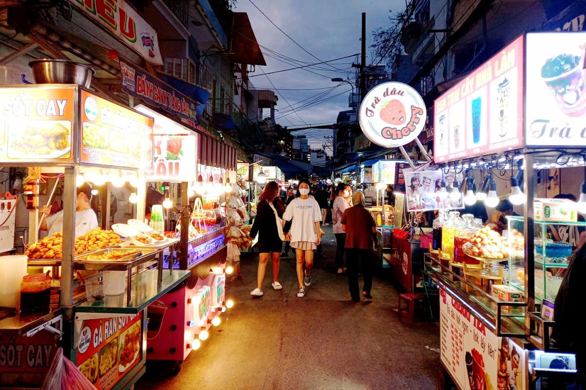 Street vendors prepare mouth-watering dishes late into the night.