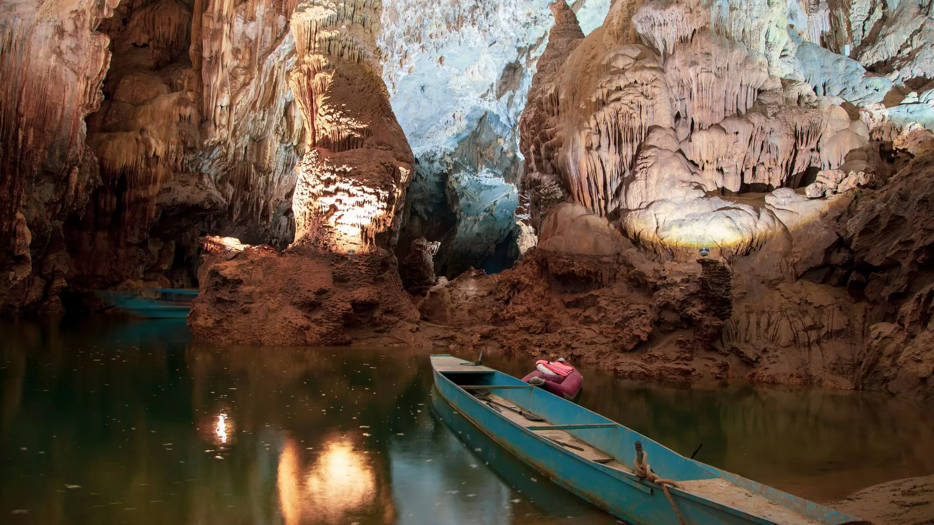 Boat rides into caverns and cathedral-like chambers of karst